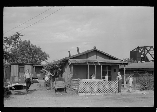 Untitled photo, possibly related to: Slums at Cinder Point between railroad and Illinois River, Peoria, Illinois