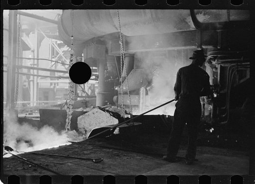 Untitled photo, possibly related to: Pouring a test mold while blast furnace is being tapped, Pittsburgh, Pennsylvania