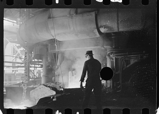 Untitled photo, possibly related to: Pouring a test mold while blast furnace is being tapped, Pittsburgh, Pennsylvania