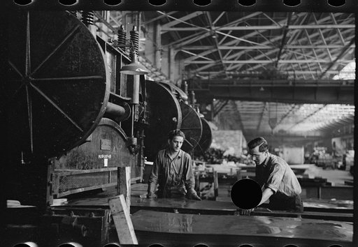 Untitled photo, possibly related to: Cutting sheet steel to size, Pittsburgh, Pennsylvania