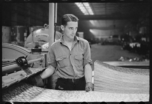 Steelworker at galvanizing machine, Pittsburgh, Pennsylvania