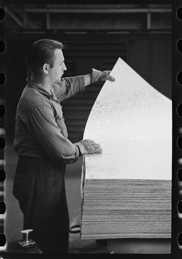 Steelworker at galvanizing machine, Pittsburgh, Pennsylvania