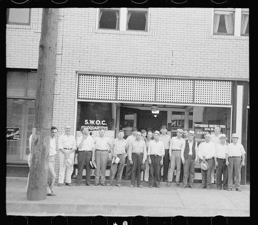 Untitled photo, possibly related to: Steelworker sitting in front of union office, Midland, Pennsylvania