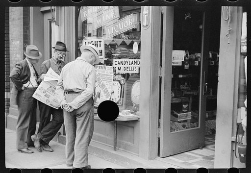 Untitled photo, possibly related to: Steelworkers reading the newspaper, Aliquippa, Pennsylvania