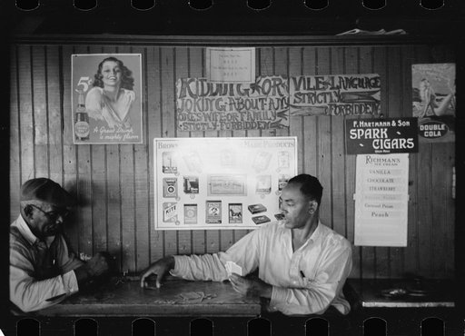 Men playing cards in restaurant, Shellpile, New Jersey