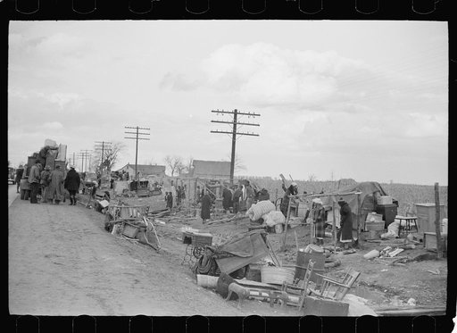 State highway officials moving sharecroppers away from roadside to area between the levee and Mississippi River, New Madrid County, Missouri