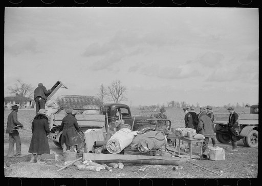 State highway officials moving sharecroppers away from roadside to area between the levee and the Mississippi River, New Madrid County, Missouri
