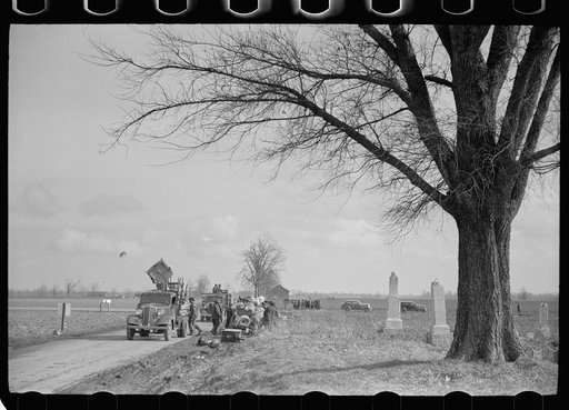 State highway officials moving sharecroppers away from roadside to area between levee and Mississippi River, New Madrid County, Missouri