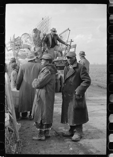 State highway officials moving sharecroppers away from roadside to area between the levee and the Mississippi River, New Madrid County, Missouri