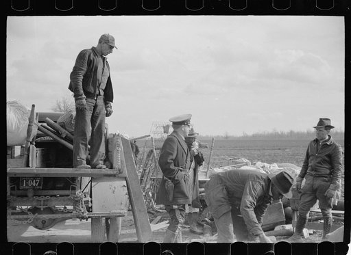 Untitled photo, possibly related to: State highway officials moving sharecroppers away from roadside to area between the levee and the Mississippi River, New Madrid County, Missouri