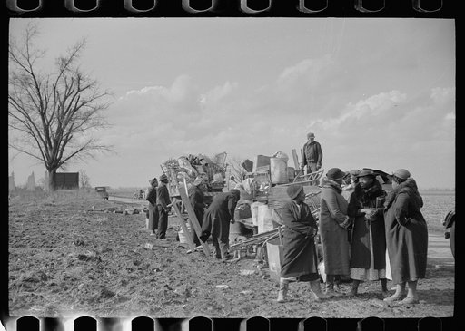 State highway officials moving sharecroppers away from roadside to area between the levee and the Mississippi River, New Madrid County, Missouri
