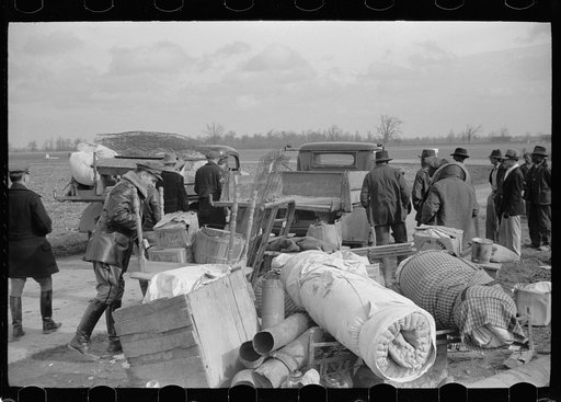 State highway officials moving sharecroppers away from roadside to area between the levee and the Mississippi River, New Madrid County, Missouri