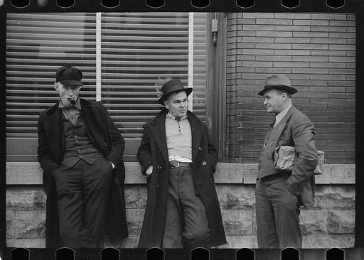 Untitled photo, possibly related to: Unemployed miners on corner of main street, Herrin, Illinois