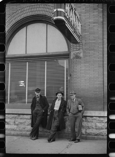 Untitled photo, possibly related to: Unemployed miners on corner of main street, Herrin, Illinois