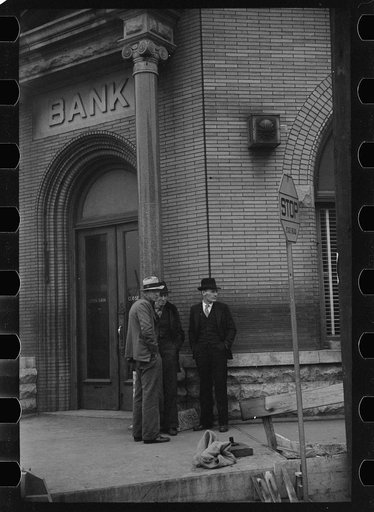 Untitled photo, possibly related to: Unemployed miners on corner of main street, Herrin, Illinois