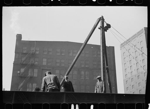 Untitled photo, possibly related to: Loading scrap iron, St. Louis, Missouri