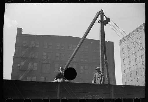 Untitled photo, possibly related to: Loading scrap iron, St. Louis, Missouri