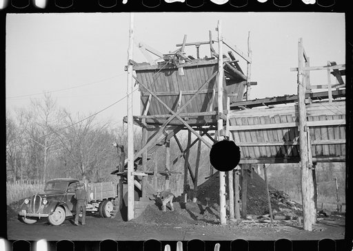 Untitled photo, possibly related to: Loading a truck at gopher hole, Williamson County, Illinois