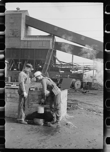 Miners drawing drinking water at Old Ben No. 8 mine, West Frankfort, Illinois