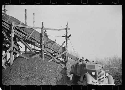 Untitled photo, possibly related to: Loading a truck at gopher hole, Williamson County, Illinois