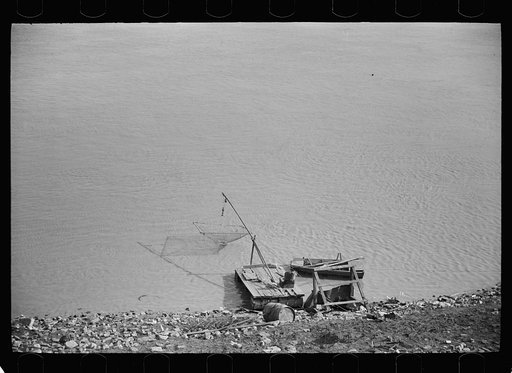 Untitled photo, possibly related to: Fisherman's raft, on shores of Mississippi River, Saint Louis, Missouri