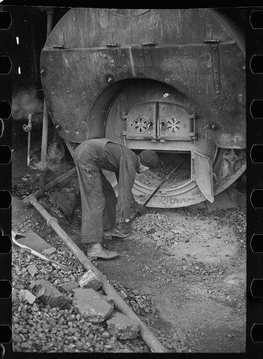 Stoking furnace at gopher hole, Williamson County, Illinois