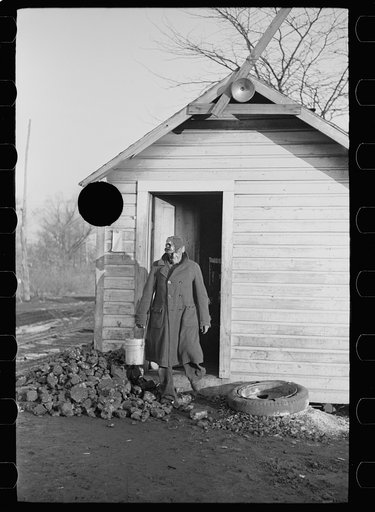 Untitled photo, possibly related to: Gopher hole miner checking out at end of day's work. Williamson County, Illinois (see 26940-D)