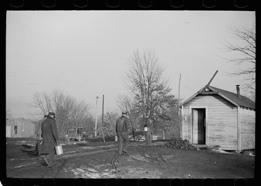 Untitled photo, possibly related to: Gopher hole miner checking out at end of day's work. Williamson County, Illinois (see 26940-D)