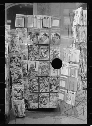 Untitled photo, possibly related to: Magazines at newsstand, Saint Louis, Missouri