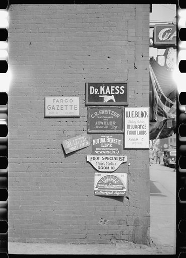 Signs at entrance to office building, Fargo, North Dakota