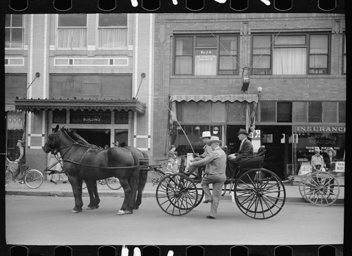 Entering a buggy, Billings, Montana