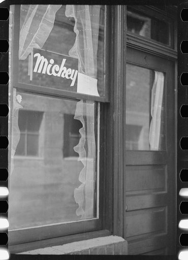 Untitled photo, possibly related to: Sign in window, Venus Alley, Butte, Montana