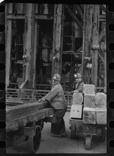 Miners at shaft of copper mine, Butte, Montana