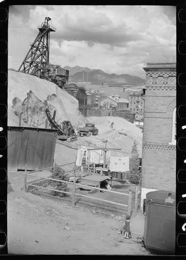 Untitled photo, possibly related to: Houses with mine hoists in backyard, Butte, Montana