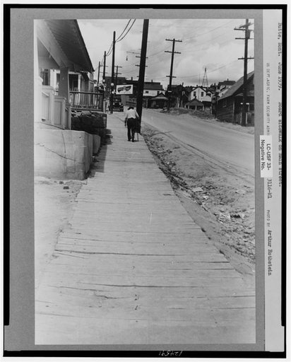 Board sidewalk on main street. Butte, Montana