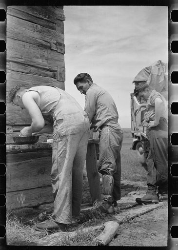 Untitled photo, possibly related to: Sheepshearers washing up, Rosebud County, Montana