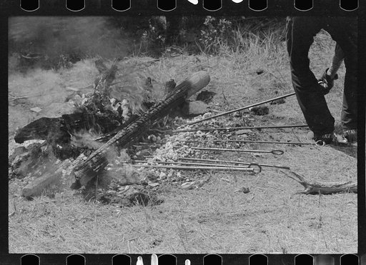 Untitled photo, possibly related to: Removing branding irons from fire, Three Circle roundup, Custer National Forest, Montana