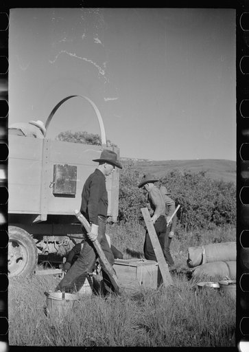 Setting up camp, Quarter Circle U roundup, Montana