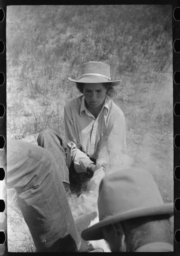 Untitled photo, possibly related to: Branding a calf, Quarter Circle U roundup, Montana