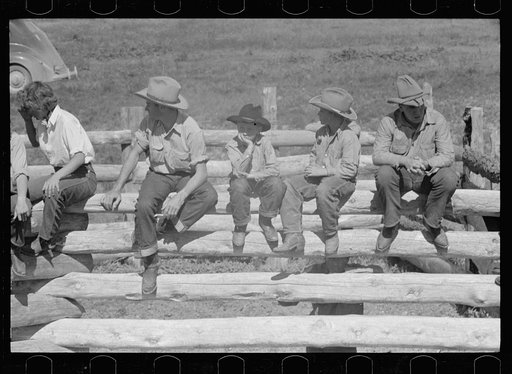Untitled photo, possibly related to: Dude girls on a corral fence, Quarter Circle U roundup, Montana