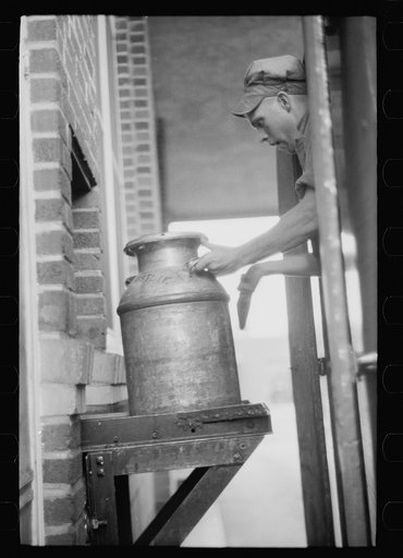 Unloading a milk truck at pasteurizing plant, Farmington, Minnesota