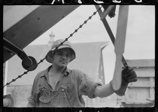 Untitled photo, possibly related to: Shelling corn for storage in EverNormal granary, Grundy County, Iowa