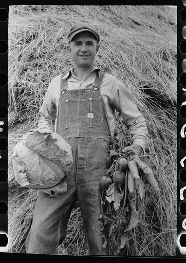 Howard Crowder displays some of the vegetables produced in his garden on San Luis Valley Farms, Alamosa, Colorado
