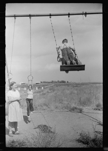 Untitled photo, possibly related to: Children of resettlement families playing in the schoolyard, community building, San Luis Valley Farms, Alamosa, Colorado