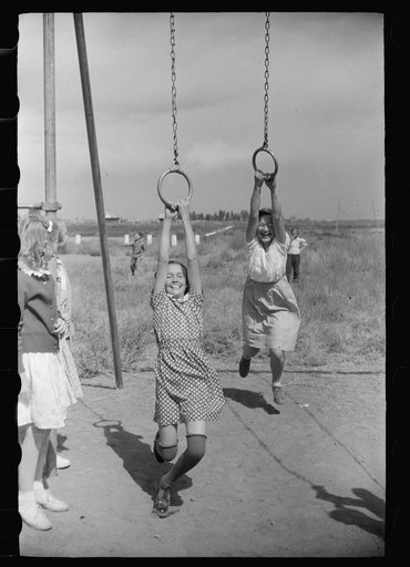 Untitled photo, possibly related to: Children of resettlement families playing in the schoolyard, community building, San Luis Valley Farms, Alamosa, Colorado