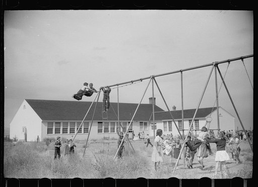 Untitled photo, possibly related to: Children of resettlement families playing in the schoolyard, community building, San Luis Valley Farms, Alamosa, Colorado