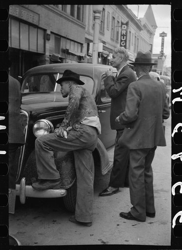 Untitled photo, possibly related to: Men watching World Series baseball scores on main street, Montrose, Colorado