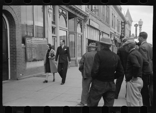 Untitled photo, possibly related to: Men watching World Series baseball scores on main street, Montrose, Colorado