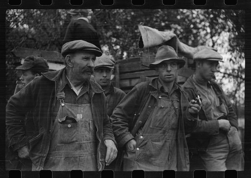 Farmers at cornhusking contest, Marshall County, Iowa