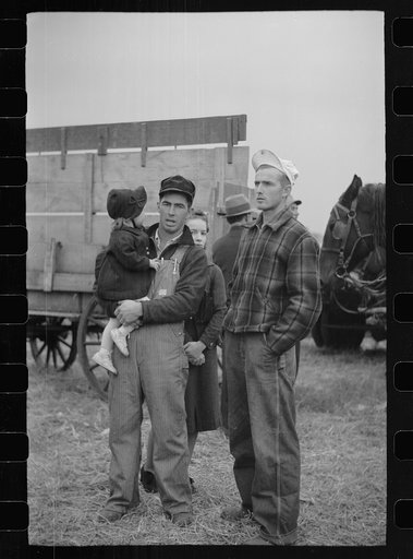 Spectators at cornhusking contest, Marshall County, Iowa
